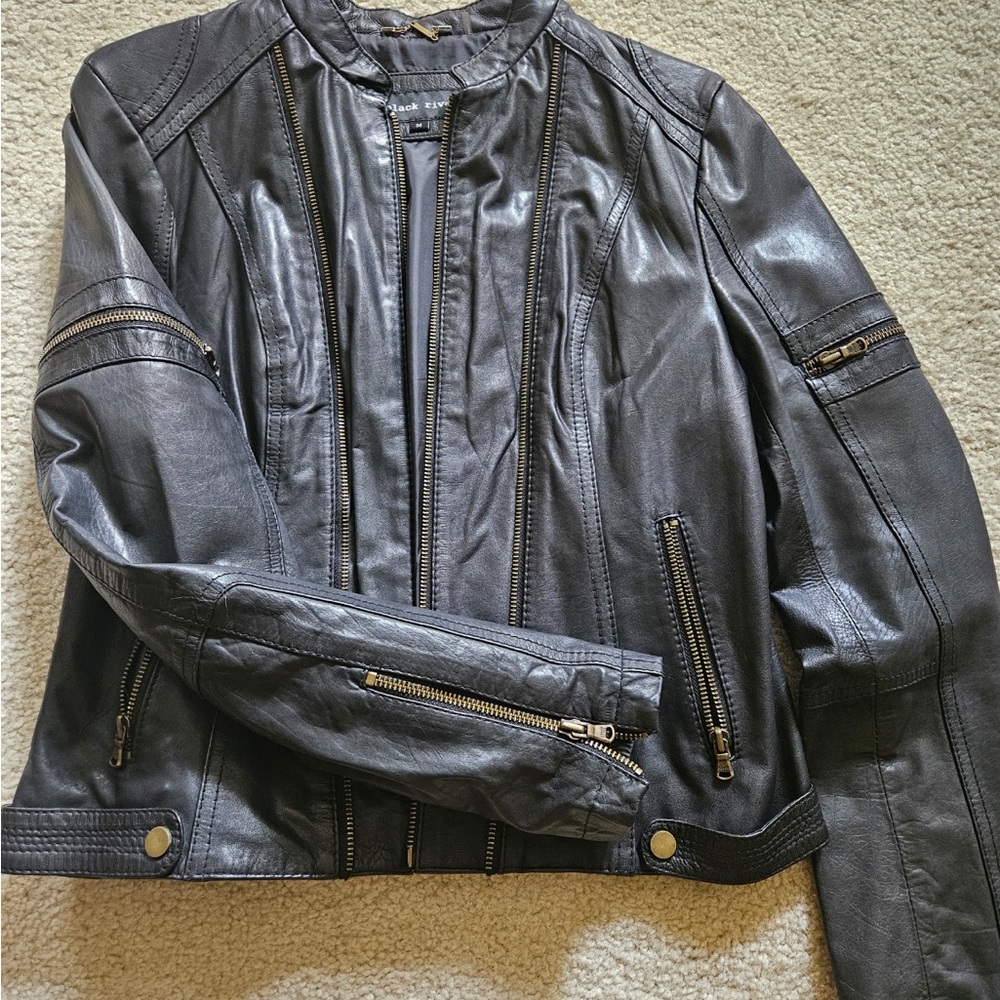 Black Leather Jacket with Zipper Details